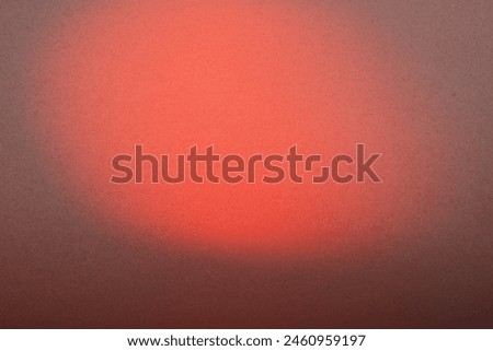 Photograph of colored light on a textured color paper background. Abstract backdrop design, horizontal. 