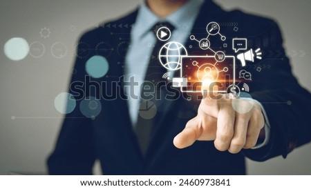 Digital marketing media (website ad, email, social network, SEO, video, mobile app) Businessman uses laptop to do online marketing to attract customers ,Merchant marketing attracts customers.