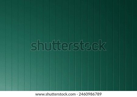Abstract rough background consisting of vertical wooden bars. The name of the color is Pearl Opal Green. Soft light from bottom left
