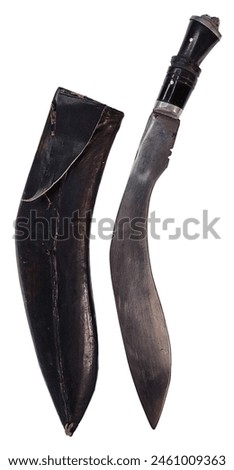 A Metal kukri with black leather scabbard Used for Defense Against an Enemy Royalty-Free Stock Photo #2461009363