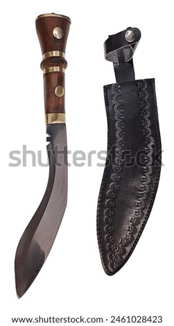 A Metal Kukri with wooden hilt and black leather scabbard Used for Defense Against an Enemy Royalty-Free Stock Photo #2461028423