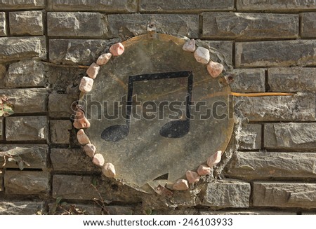 Close up sign of musical note on vintage wall