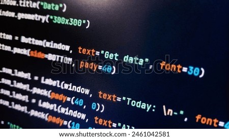 Programming code text on computer screen, macro photo