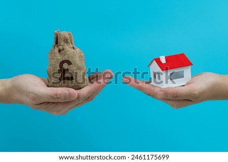 Money change house on blue background