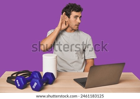 Hispanic trainer planning workout trying to listening a gossip. Royalty-Free Stock Photo #2461183125
