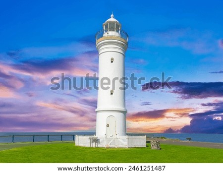 Beautiful lighthouse at Sunset over the Pacific Ocean on cliffs of Kiama Sydney NSW Australia Coastal Beach fishing Town