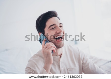 Photo of glad attractive nice man enjoying weekend morning time cozy room white day light interior indoors Royalty-Free Stock Photo #2461363039