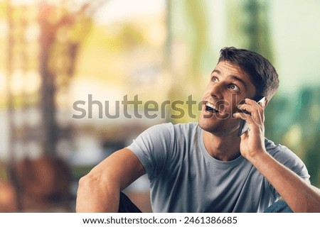 Happy smiling  business man holding smartphone