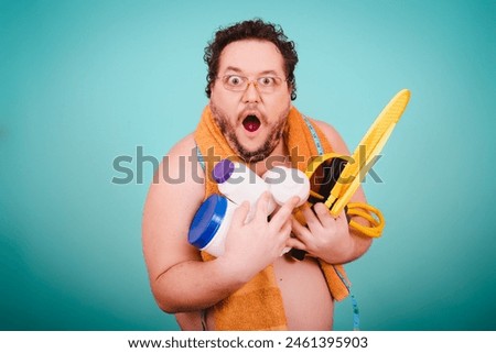 Funny fat man and sporty lifestyle. Fitness bad habits. Blue background.