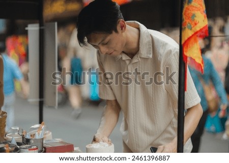 the young lovely couple is walking around traditional food market under the sun, love is showing from their face when they have conversation because they love each other, dating