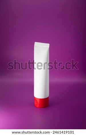 Clear cosmetic container mock up on pink background. Face and body skin care cream pack. Royalty-Free Stock Photo #2461419101