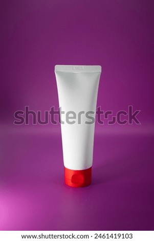 Clear cosmetic container mock up on pink background. Face and body skin care cream pack. Royalty-Free Stock Photo #2461419103