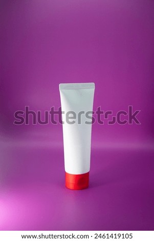 Clear cosmetic container mock up on pink background. Face and body skin care cream pack. Royalty-Free Stock Photo #2461419105
