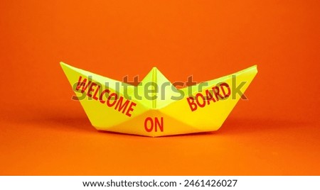 Welcome on board symbol. Concept words Welcome on board on beautiful yellow paper boat. Beautiful orange background. Business, motivational welcome on board concept. Copy space.