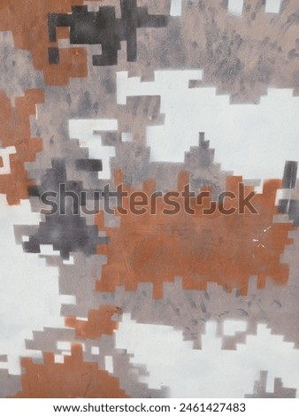 a brown and orange colored on the wall