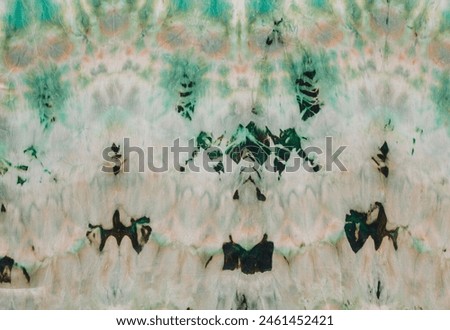 abstract pattern on silk fabric texture in green tones close up