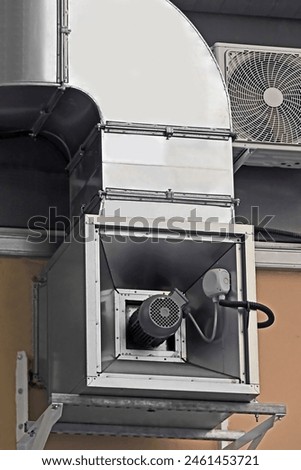 Industrial air ventilation system funnel on wall