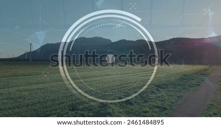 Image of financial data processing over clock and countryside. Global environment, finance, business, connections, computing and data processing concept digitally generated image.