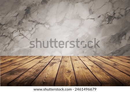 Empty wooden desk with abstract cement background