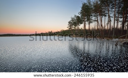 Frozen lake winter sunrise landscape