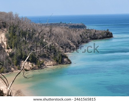 Pictured Rocks National Lakeshore is one of four national parks sites in Michigan’s Upper Peninsula, known for its stunning and colorful sandstone cliffs.