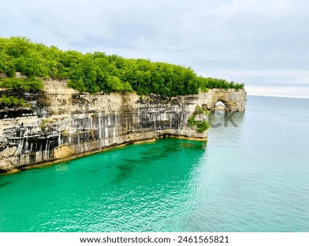 Pictured Rocks National Lakeshore is one of four national parks sites in Michigan’s Upper Peninsula, known for its stunning and colorful sandstone cliffs.