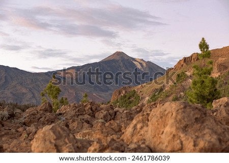 A mountain range with a cloudy sky in the background,El Teide Tenerife Canary island