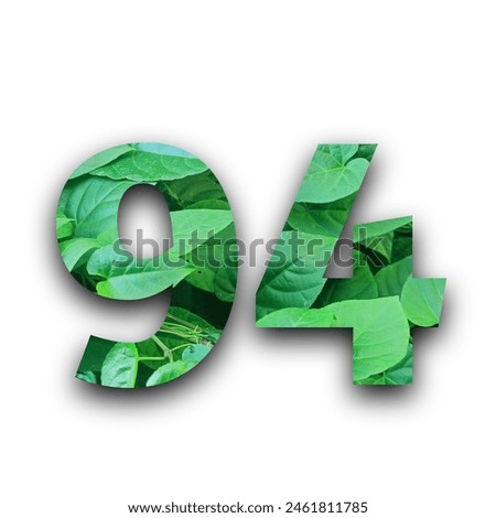 Leafs number 94 made of Real alive leafs with Precious paper cut shape of number with white background. Leafs font. Isolated white background