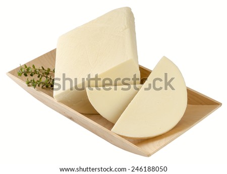 Provolone cheese in wooden tray . Clipping path. Royalty-Free Stock Photo #246188050
