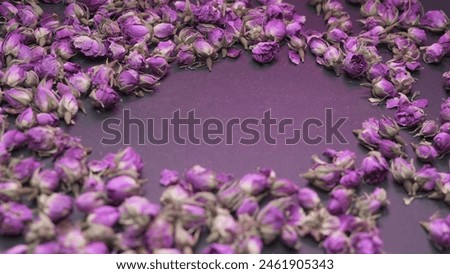 Dried rose buds background with text space
