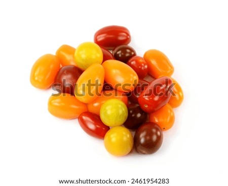 Different sorts of tomatoes isolated on white background.