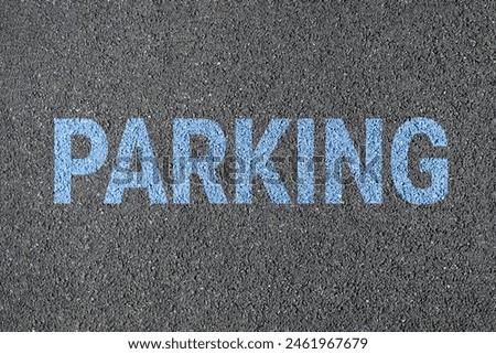 Parking sign on road. drawn with color paint on asphalt. 