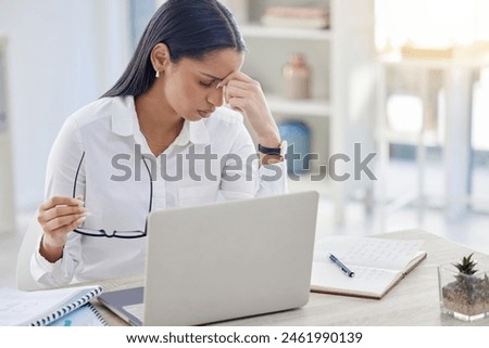 Headache, laptop and business woman with glasses in office for editing report, burnout or project deadline. Fatigue, stress and tired journalist, editor or female employee at desk for news agency