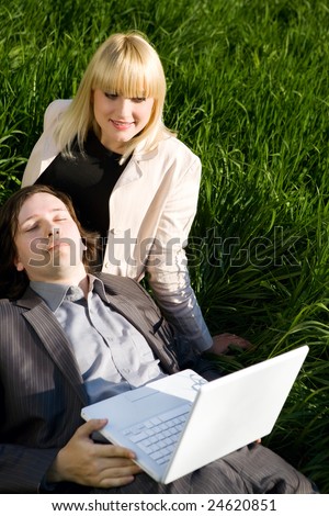 girl and boy rest with laptop
