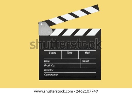 Motion picture board, camera action, film studio, industry standard. Royalty-Free Stock Photo #2462107749