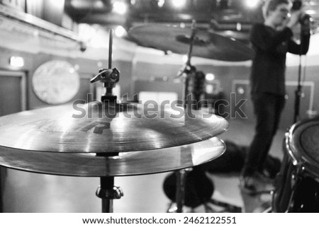 Black and white closeup of a hi-hat on a drumkit