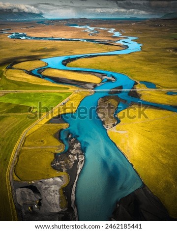 Aerial view of Bridge over Braided River in Iceland. Royalty-Free Stock Photo #2462185441