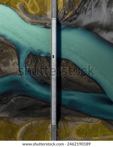 Aerial view of Bridge over Braided River in Iceland  Royalty-Free Stock Photo #2462190189