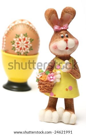 Easter bunny with easter egg on white background.