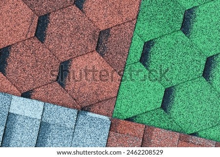 It's a close up view of mosaic colorful tile. It is photo of green, blue and a brown roof tiles. It is view of multicolored texture of tiles.