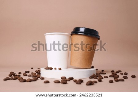 Two Coffe Cup On Podium For Advertisement Mockup With Coffee Beans Isolated Over Brown Background