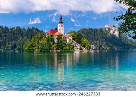 Bled with lake, island  and mountains in background, Slovenia, Europe Royalty-Free Stock Photo #246227383