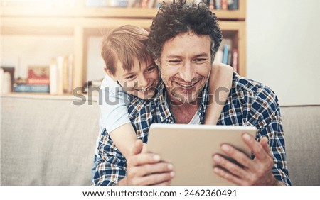 Happy, tablet and father with child in home for watching movies, cartoons and online entertainment. Family, love and dad with son on digital tech for internet, video call and relax on weekend on sofa