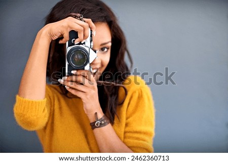 Portrait, excited and woman with vintage camera by studio background for shooting photo, image or picture. Mockup space, female photographer for creative memory, lens and focus with retro equipment