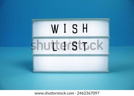 Wish List letterboard text on LED Lightbox on blue background