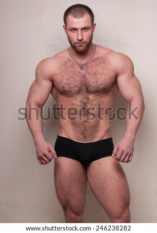 Nuscled male model with body hair 