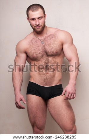 Nuscled male model with body hair 