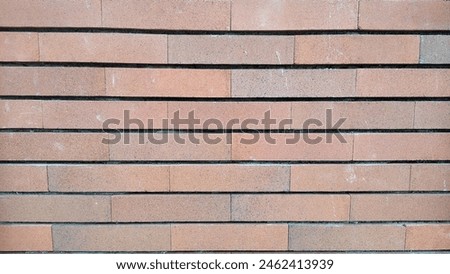 Rustic Exposed Fire Brick Wall
High-resolution image of an exposed fire brick wall.
The bricks are laid out in a row, creating a sense of depth and texture.
