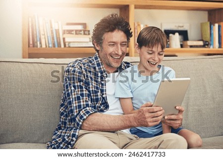 Laugh, tablet and father with child in home for watching movies, cartoons and online entertainment. Family, love and dad with son on digital tech for internet, video call and relax on weekend on sofa