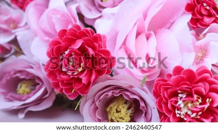Close-up of the artificial pink flowers. artificial Flower as a wedding decoration. Flower background. selective focus